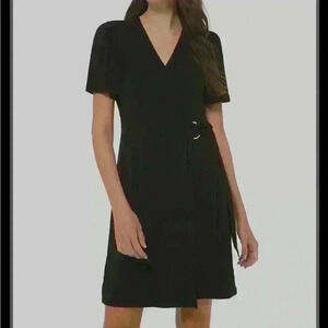 Michael Kors black above knee wrap dress with gold ring detail